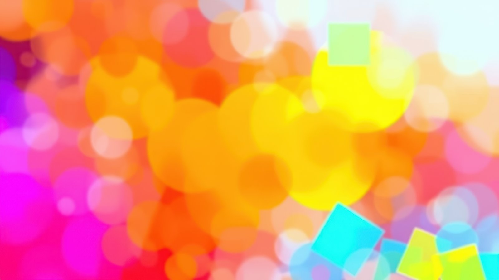 Colorful abstract background featuring vibrant shapes and soft bokeh effects during a bright sunny day